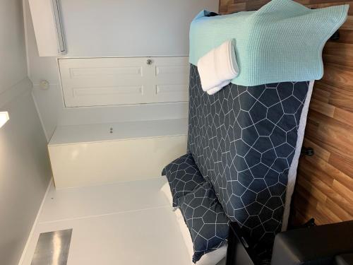 Letto o letti in una camera di Wine Country Tourist Park Hunter Valley