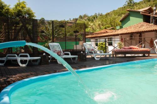 Het zwembad bij of vlak bij Recanto do Sossego
