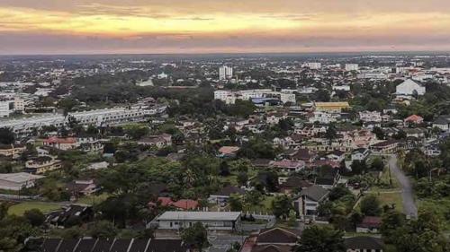 an aerial view of a city with buildings at Taiping Rain Town Homestay太平雨城名宿 two car park in Taiping