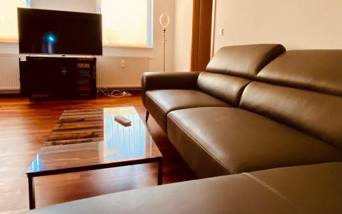 TV a/nebo společenská místnost v ubytování Moderne Wohnung in Eberswalde