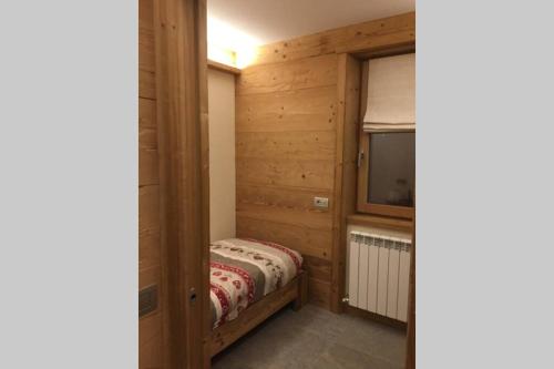 Postel nebo postele na pokoji v ubytování Appartamento Caste Solena