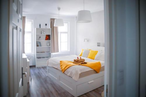 Posteľ alebo postele v izbe v ubytovaní Malasits Art Home