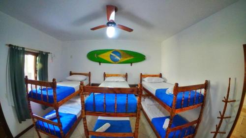 Voodi või voodid majutusasutuse Raio de Sol pousada & camping toas