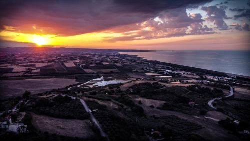 an aerial view of a city at sunset at Residenza B&B VistaMare in Petacciato