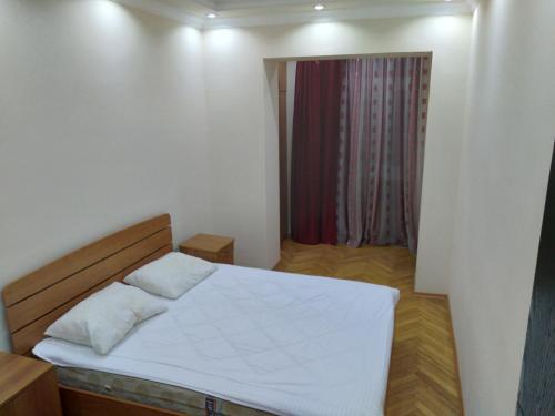 Ліжко або ліжка в номері Apartment Melashvili 4