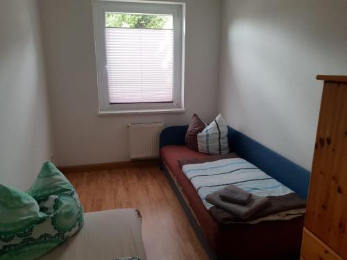 Säng eller sängar i ett rum på SchlafSchön Apartment- Monteurunterkunft Gerichshain