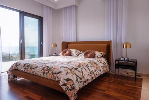 Villa No 1 - Cap St Georges Resort tesisinde bir odada yatak veya yataklar