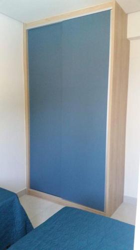 Ένα ή περισσότερα κρεβάτια σε δωμάτιο στο Lindo apartamento Riverside Imbassaí