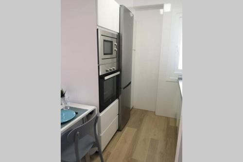 Kuchyňa alebo kuchynka v ubytovaní Piso moderno con garaje en el centro de Vigo