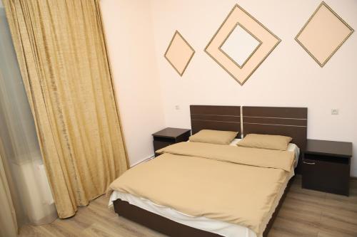 Ένα ή περισσότερα κρεβάτια σε δωμάτιο στο Hotel Gold