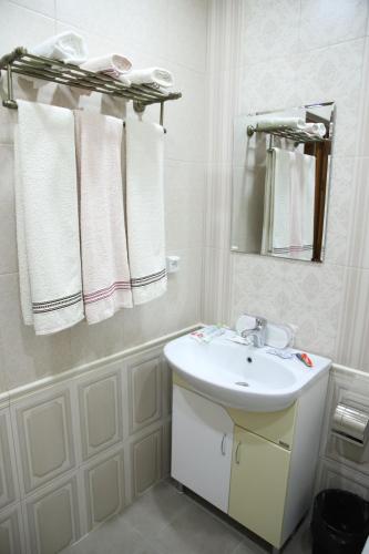 Koupelna v ubytování Hotel Gold