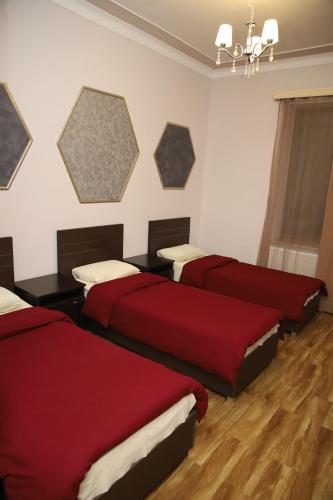 Ένα ή περισσότερα κρεβάτια σε δωμάτιο στο Hotel Gold