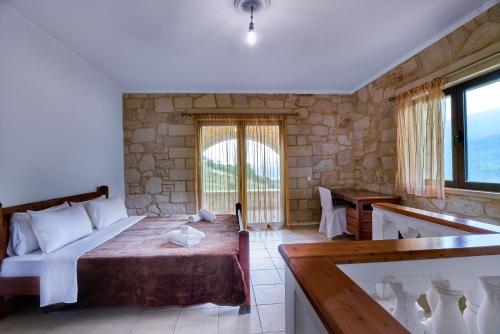 Cama o camas de una habitación en ANEMOS residence