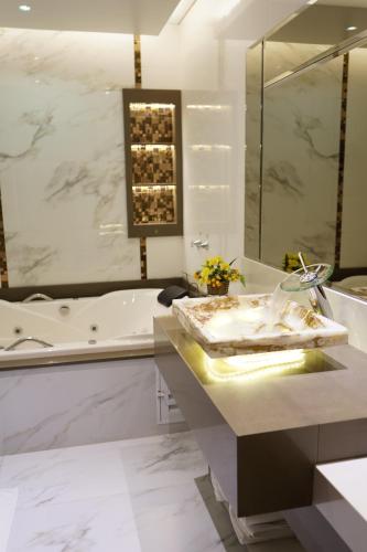 Koupelna v ubytování Pak Suítes Hotel