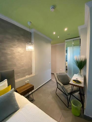 Кровать или кровати в номере Central Boutique Hotel