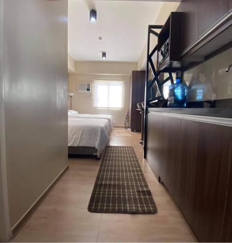 Katil atau katil-katil dalam bilik di Twin Bed Unit- MIGAs Haven at Sunvida Tower