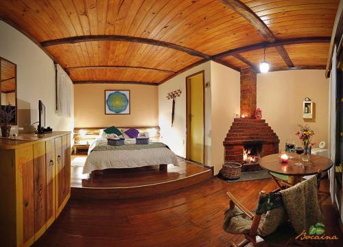 Ένα ή περισσότερα κρεβάτια σε δωμάτιο στο Pousada Bocaina