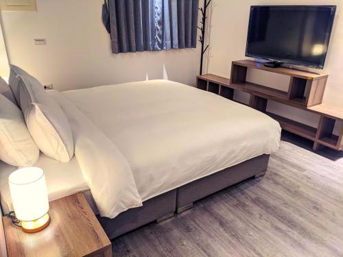TV a/nebo společenská místnost v ubytování LanCheng Le Petit Voy