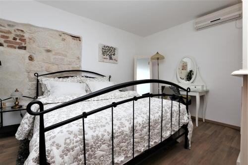 Posteľ alebo postele v izbe v ubytovaní Apartment ARCHIE