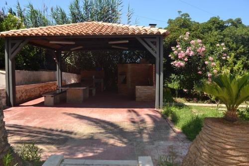Κήπος έξω από το Le Palme Vacanze