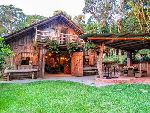 Taman di luar Rancho do Lucas - Cabana e Chalé