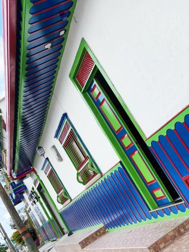 a building with colorful windows on the side of it at Casa Boutique Hotel in Salento
