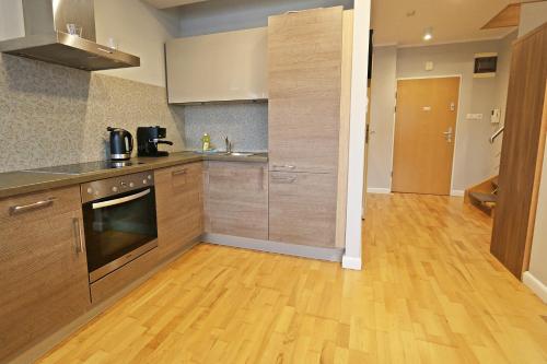 A kitchen or kitchenette at Baltic Home Casa Marina Spa