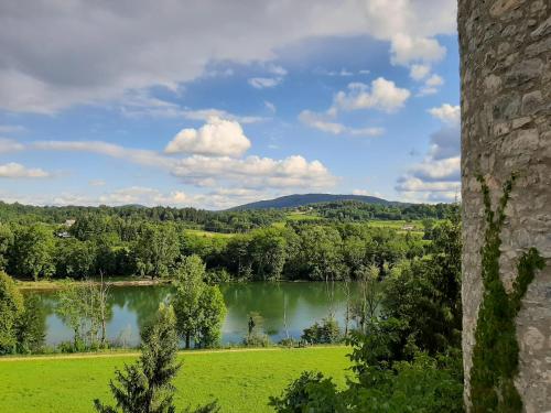 a view of a lake from a castle at Vinica Castle Boutique & Spa Hotel in Vinica