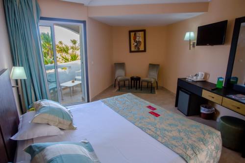 Postel nebo postele na pokoji v ubytování Fiesta Beach Djerba
