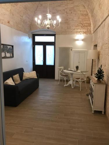 Zona de estar de Nido di pietra-dimora in centro
