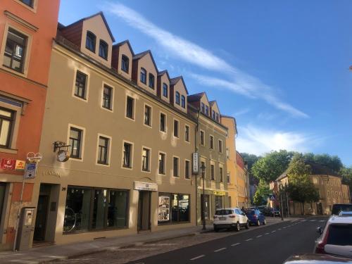 a building on the side of a city street at Pension Burkhardt in Meißen