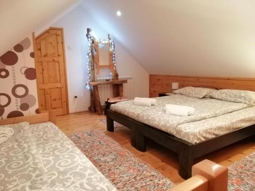 Postel nebo postele na pokoji v ubytování Apartment Nikitovic