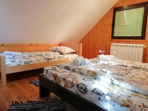 Postel nebo postele na pokoji v ubytování Apartment Nikitovic