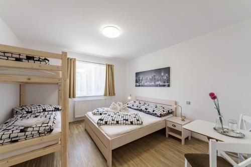 Postel nebo postele na pokoji v ubytování Penzion DaJa