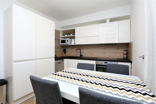 Kuchyňa alebo kuchynka v ubytovaní Apartment ARCHIE