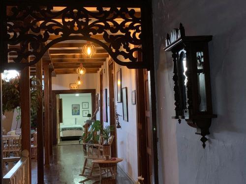 an entrance to a house with an ornate ceiling at La Estancia Hotel Boutique in Salamina