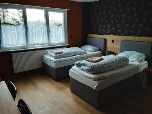 Un ou plusieurs lits dans un hébergement de l'établissement Gründauer Schlafstub