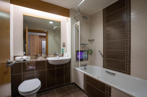Koupelna v ubytování Belmore Court & Motel