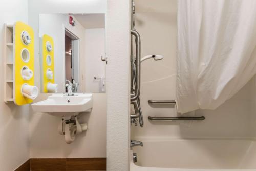 a bathroom with a sink and a shower at Motel 6 Wilkes Barre Arena in Wilkes-Barre
