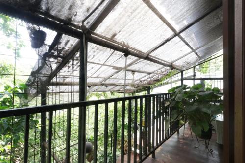 Balkoni atau teres di NILA HOUSE, Sharia Family Home Stay