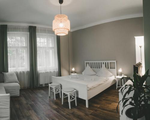 Postel nebo postele na pokoji v ubytování Apartmány Natálie