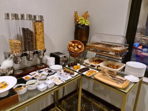 a buffet with many different types of food at Iris Boutique Granada in Riyadh