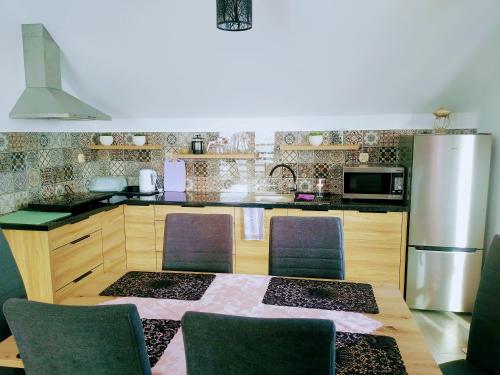 Η κουζίνα ή μικρή κουζίνα στο Apartament Bukowinka