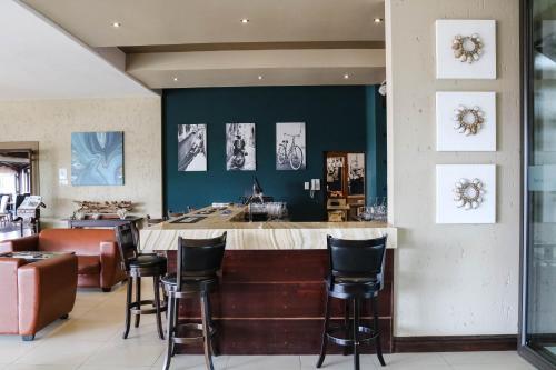Et opholdsområde på Coco De Mer Boutique Hotel