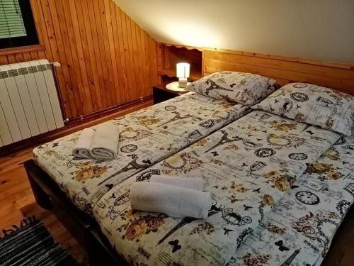 Postel nebo postele na pokoji v ubytování Apartment Nikitovic
