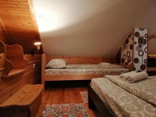 Łóżko lub łóżka w pokoju w obiekcie Apartment Nikitovic