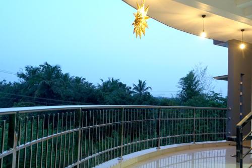 a view from the balcony of a house at Pearl Inn in Kottakkal