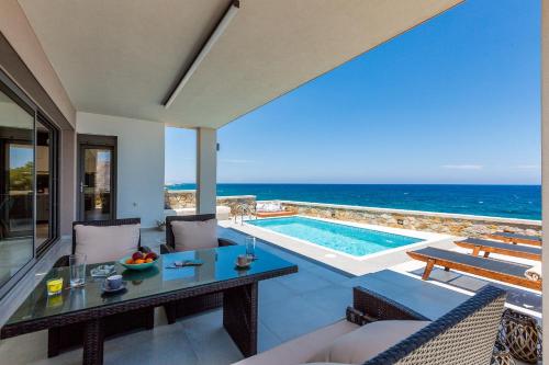 a villa with a view of the ocean at Ethereal Villa in Panormos Rethymno