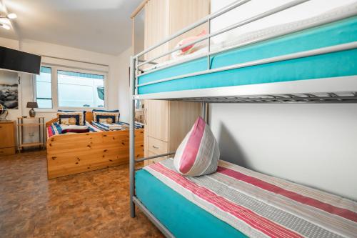 Postel nebo postele na pokoji v ubytování Motel Home Berlin
