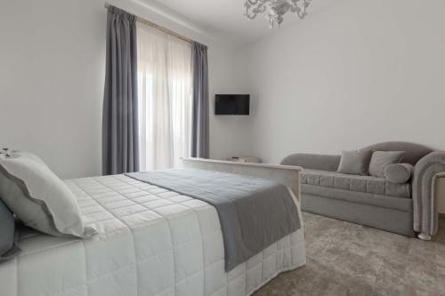 En eller flere senge i et værelse på B&B Le Radici del Salento by BarbarHouse